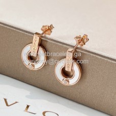 Boucles d'oreilles Bvlgari BVLGARI en or rose avec nacre et diamants de qualité Boucles d'oreilles Bvlgari BVLGARI en or rose avec nacre et diamants de qualité