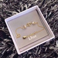 Bracelet chaîne réglable en or jaune Dior perles blanches pour femme avec logo CD