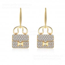 Boucles d'oreilles Hermes Constance Amulette Or blanc/Or rose/Or jaune