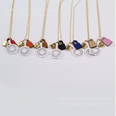 Pendentif Hermes OKelly en cuir de veau Swift avec matériel plaqué or