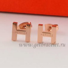Boucles d'oreilles Hermes H en or rose
