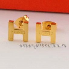 Boucles d'oreilles Hermes H en Or Jaune