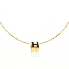 Collier Hermes Cage dH noir en laque or jaune Collier Hermes Cage dH noir en laque or jaune