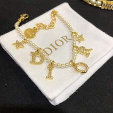 Dior Dioevolution Or Jaune Pavé Diamants Pendentifs Logo DIOR Femme Bracelet Perle Blanche