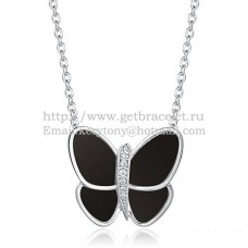 Van Cleef Arpels Collier pendentif papillon volant en or blanc avec diamants onyx noirs