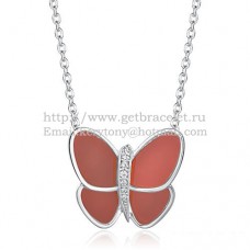 Van Cleef Arpels Collier pendentif papillon volant en or blanc avec diamants onyx rouges Van Cleef Arpels Collier pendentif papillon volant en or blanc avec diamants onyx rouges